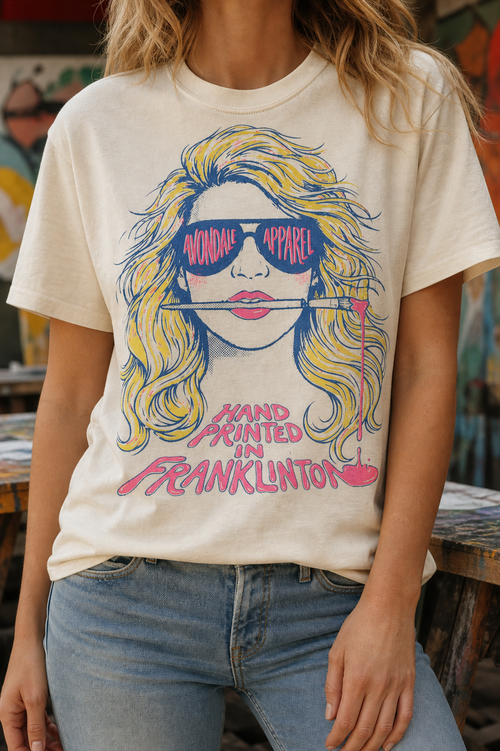 The Painter ivory tee on model with Avondale Apparel sunglasses graphic